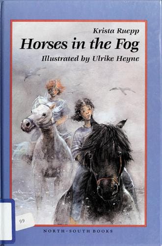 Horses in the fog