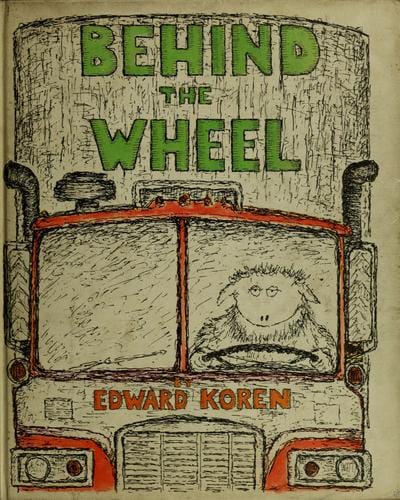 Behind the wheel.