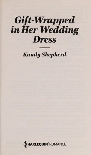 Gift-wrapped in her wedding dress
