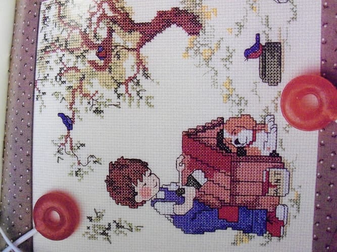 Sarah Kay - An Undated Calendar with Designs in Counted Cross Stitch