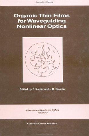Organic thin films for waveguiding nonlinear optics