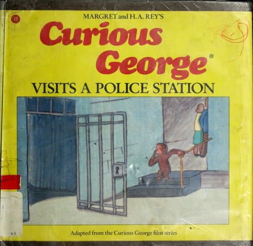Curious George visits a police station