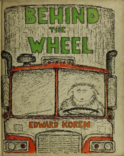Behind the wheel.