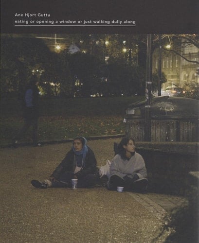 Ane Hjort Guttu eating or opening a window or just walking dully along