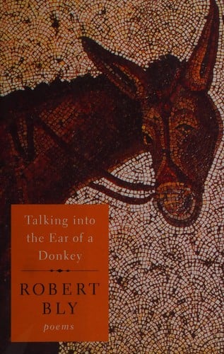 Talking into the ear of a donkey