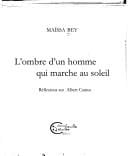 L' ombre d'un homme qui marche au soleil